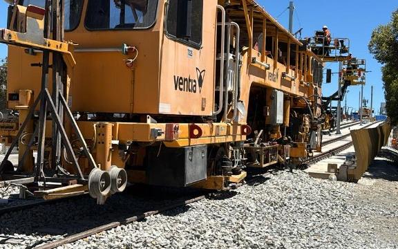 Track machine on the Tram Grade Separation Project